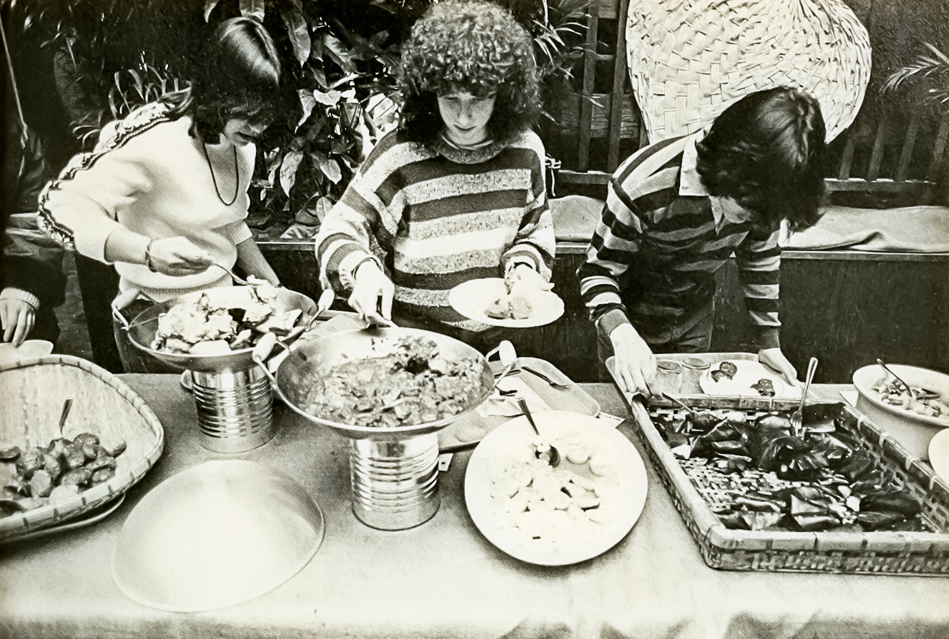 students help themselves at a buffet